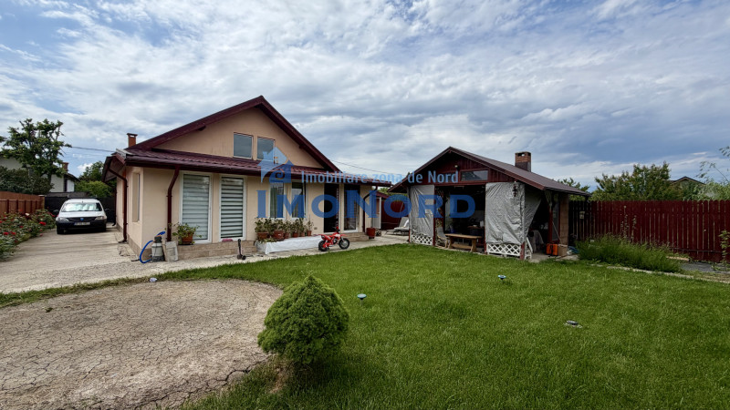 Tunari casă în Dimieni – 3 camere, curte amenajată, grădină cu seră, parcare