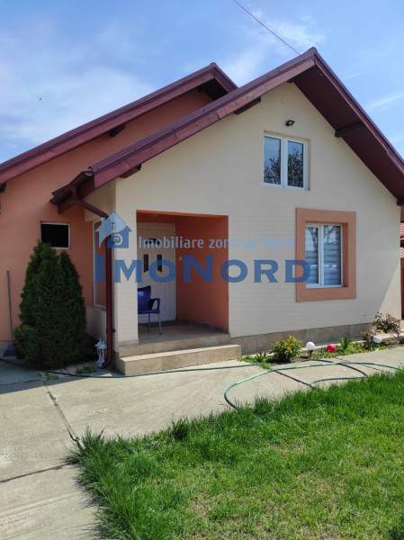 Tunari casă în Dimieni – 3 camere, curte amenajată, grădină cu seră, parcare