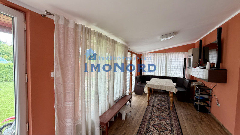 Tunari casă în Dimieni – 3 camere, curte amenajată, grădină cu seră, parcare