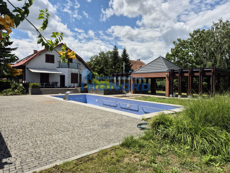 Proprietate exclusivistă cu 7.000 mp teren, piscină și multiple spații adiacente