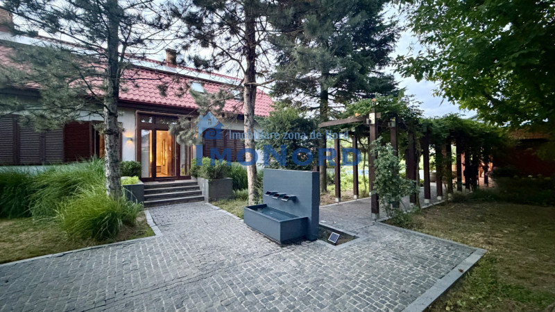 Proprietate exclusivistă cu 7.000 mp teren, piscină și multiple spații adiacente