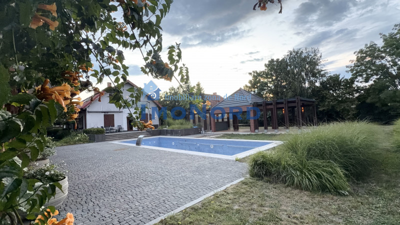 Proprietate exclusivistă cu 7.000 mp teren, piscină și multiple spații adiacente
