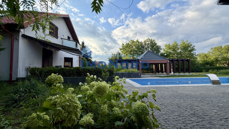 Proprietate exclusivistă cu 7.000 mp teren, piscină și multiple spații adiacente