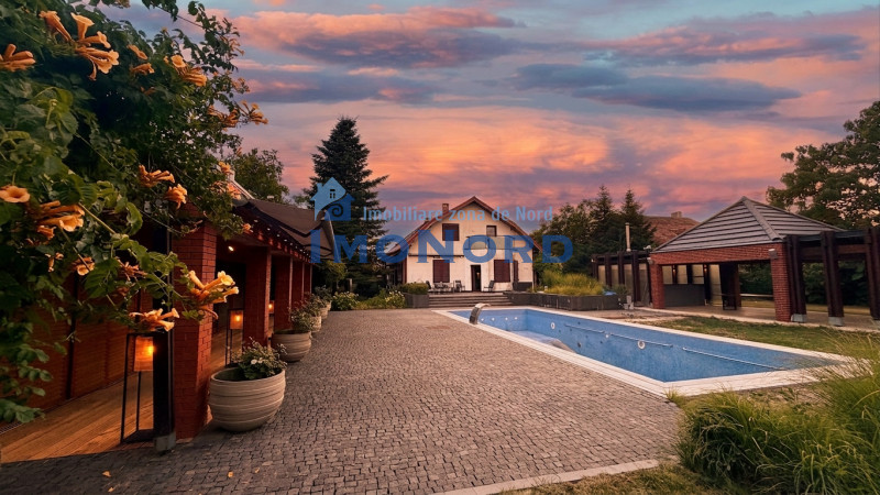 Proprietate exclusivistă cu 7.000 mp teren, piscină și multiple spații adiacente